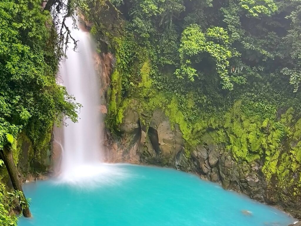 Light blue river waterfall